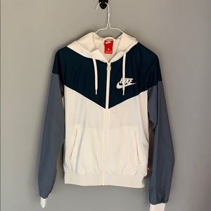 Navy, grey, and white Nike windbreaker